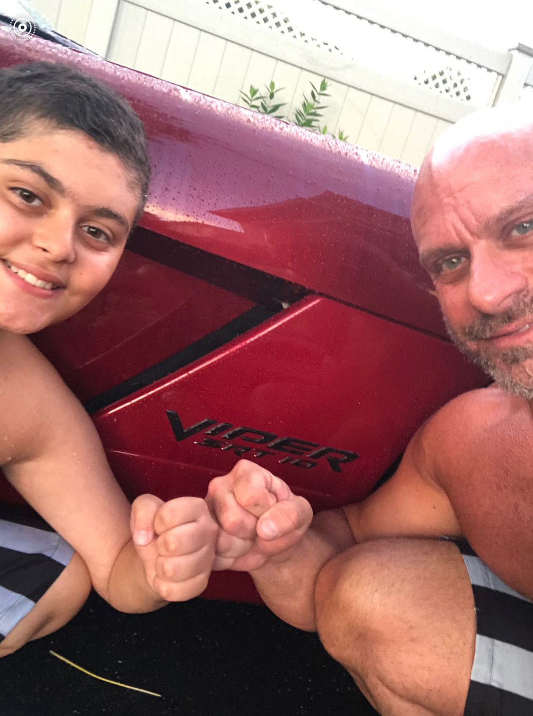 Steven Panzella with his son and Dodge Viper